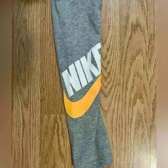 Nike leggings, women’s size small, gray with orange swoosh - Picture 3 of 4